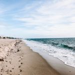 ocean under cloudy sky
